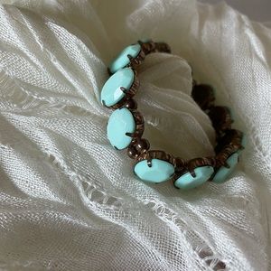 Turquoise connector with gold tone Bali ball